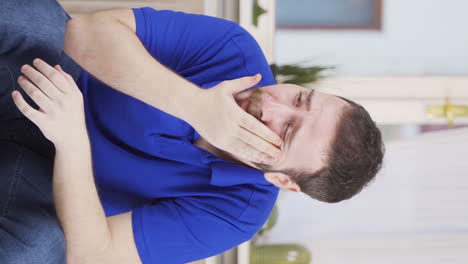 Vertical-video-of-Sad-man-is-crying.